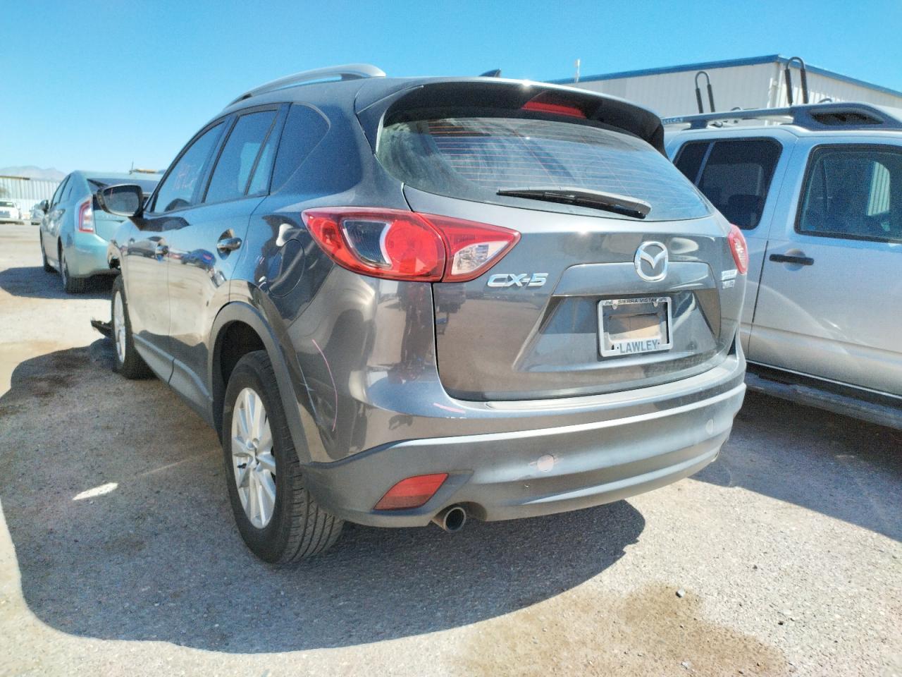 Photo 3 from auction – 2014 MAZDA CX-5 SPORT with VIN JM3KE2BE1E0390474