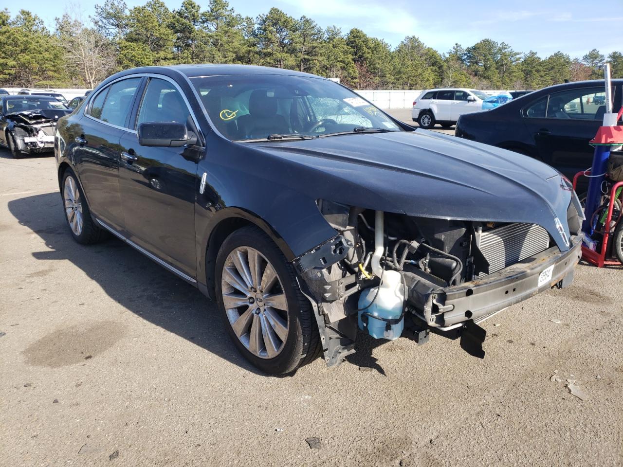 LINCOLN MKS 2013 with VIN 1LNHL9FT5DG604801 - Photo from auction