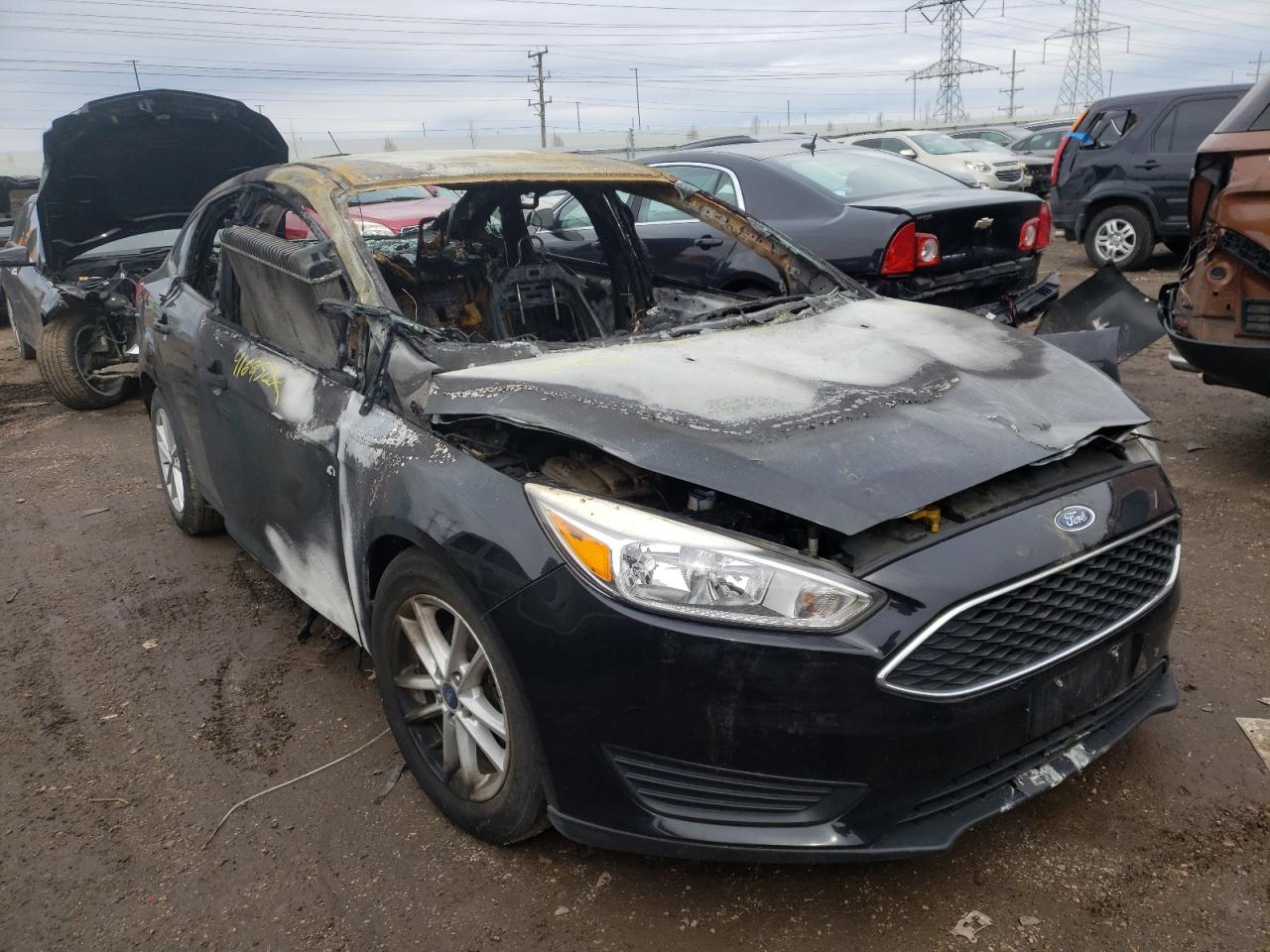 FORD FOCUS SE 2018 with VIN 1FADP3F29JL320057 - Photo from auction