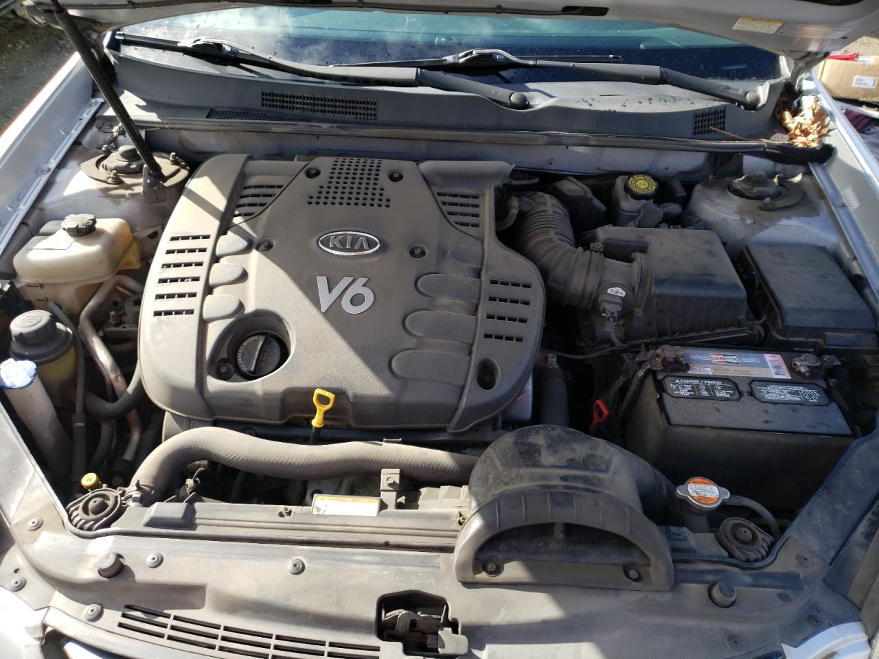 Photo 7 from auction – 2007 KIA OPTIMA LX with VIN KNAGE124775112990