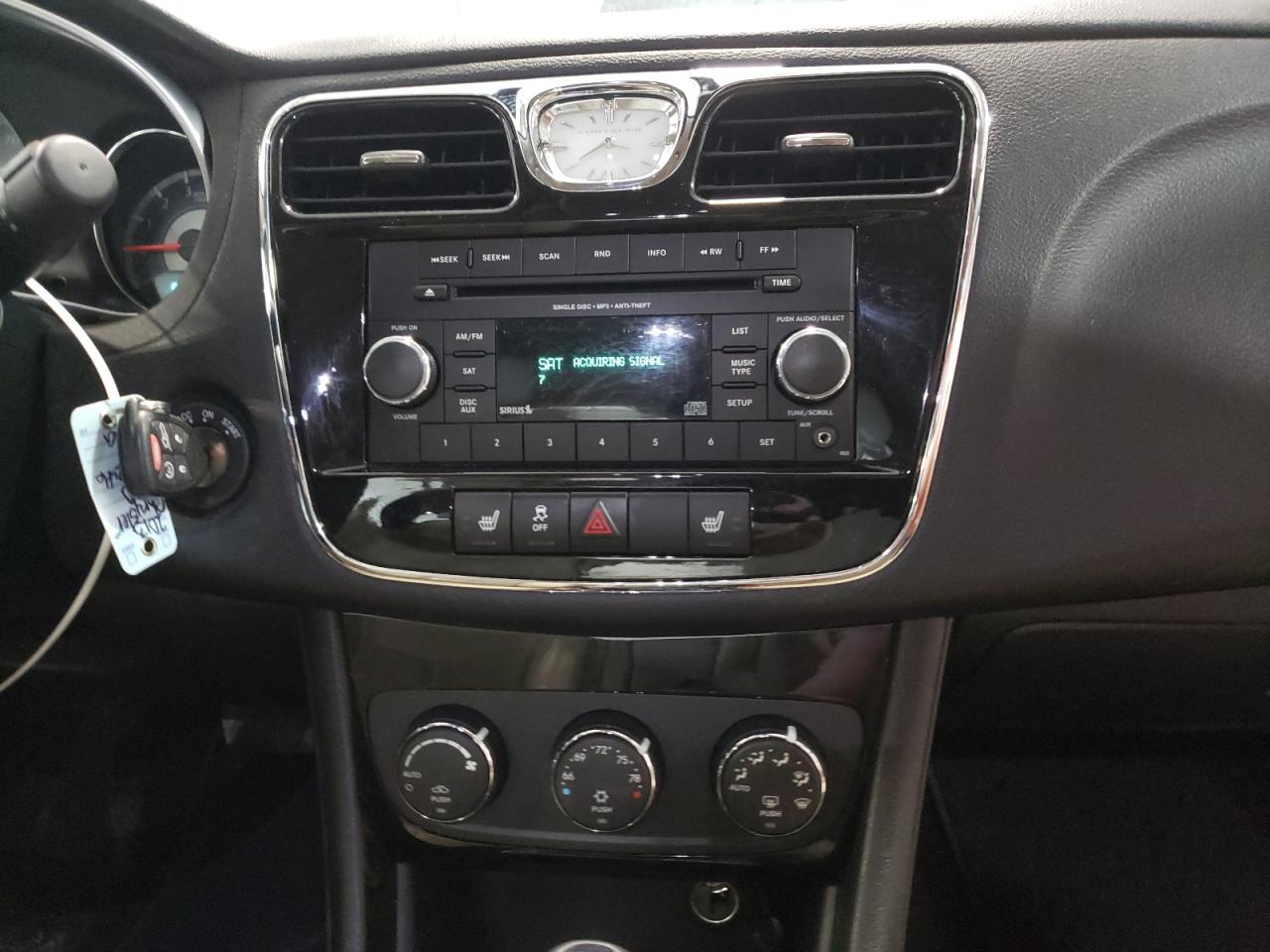 Photo 9 from auction – 2013 CHRYSLER 200 LIMITE with VIN 1C3CCBCG9DN550349