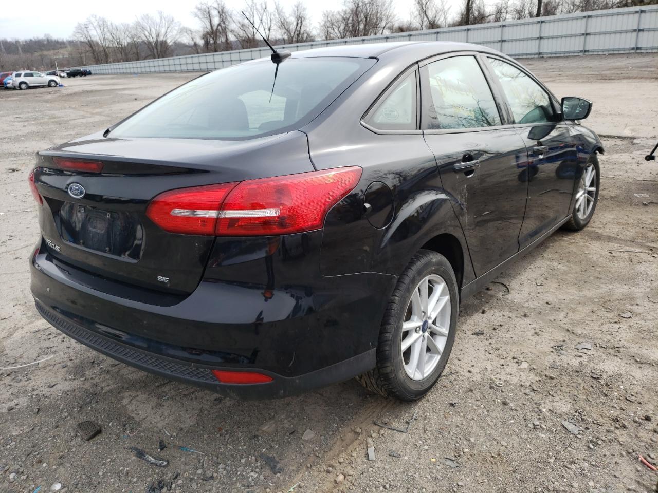 Photo 4 from auction – 2017 FORD FOCUS SE with VIN 1FADP3F24HL323510