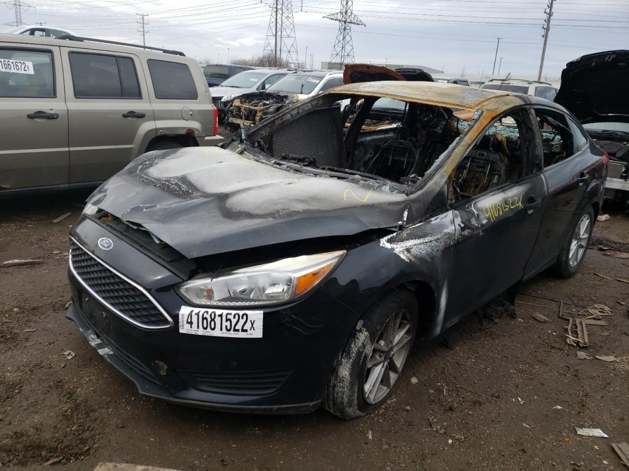 Photo 2 from auction – 2018 FORD FOCUS SE with VIN 1FADP3F29JL320057