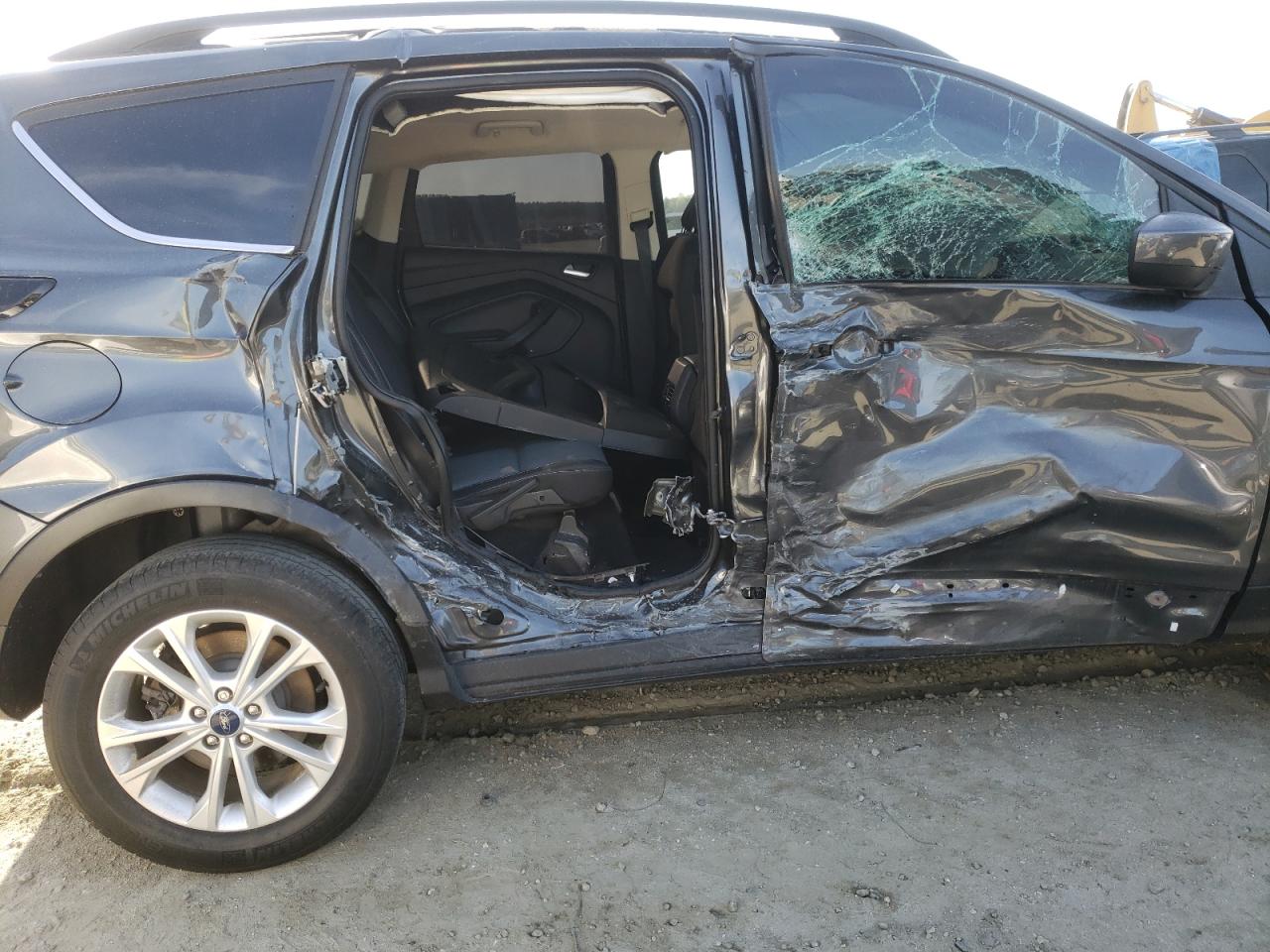 Photo 9 from auction – 2018 FORD ESCAPE SE with VIN 1FMCU0GD5JUC46901