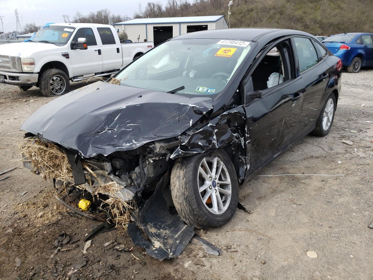 Photo 2 from auction – 2017 FORD FOCUS SE with VIN 1FADP3F24HL323510