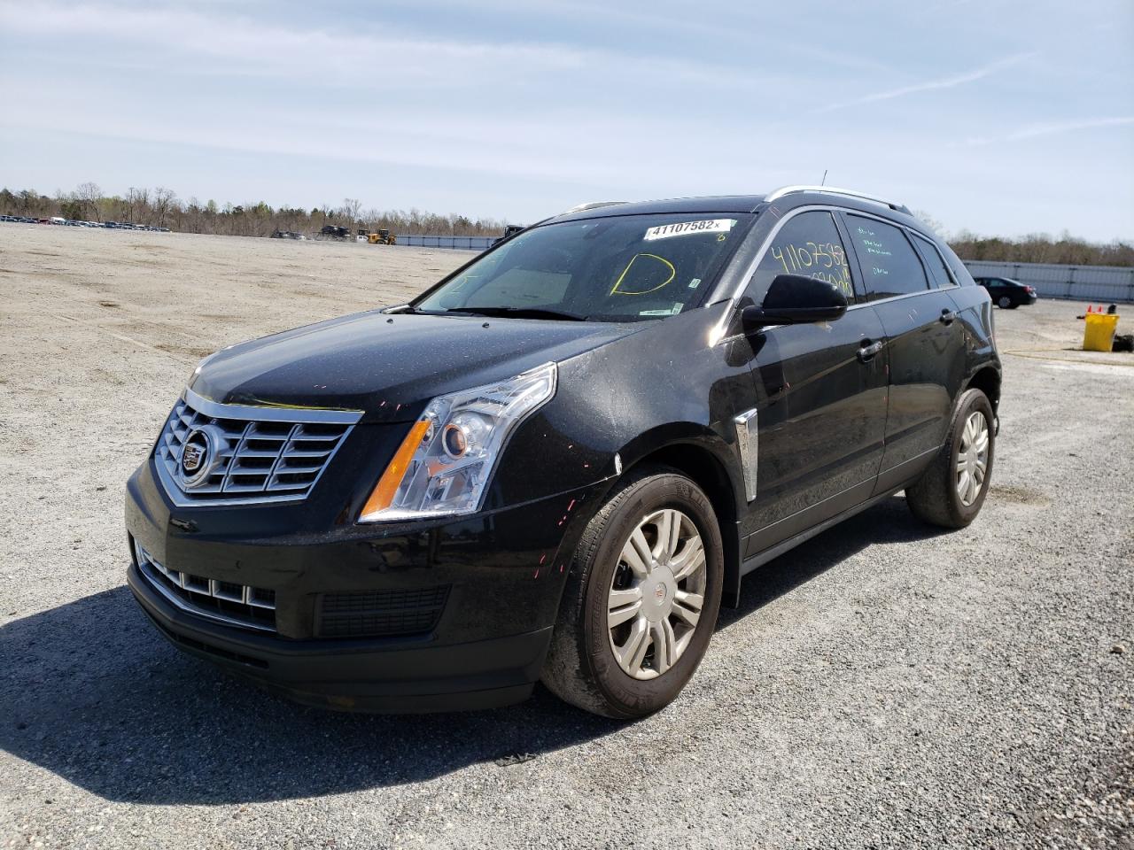 Photo 2 from auction – 2014 CADILLAC SRX LUXURY with VIN 3GYFNEE31ES615632