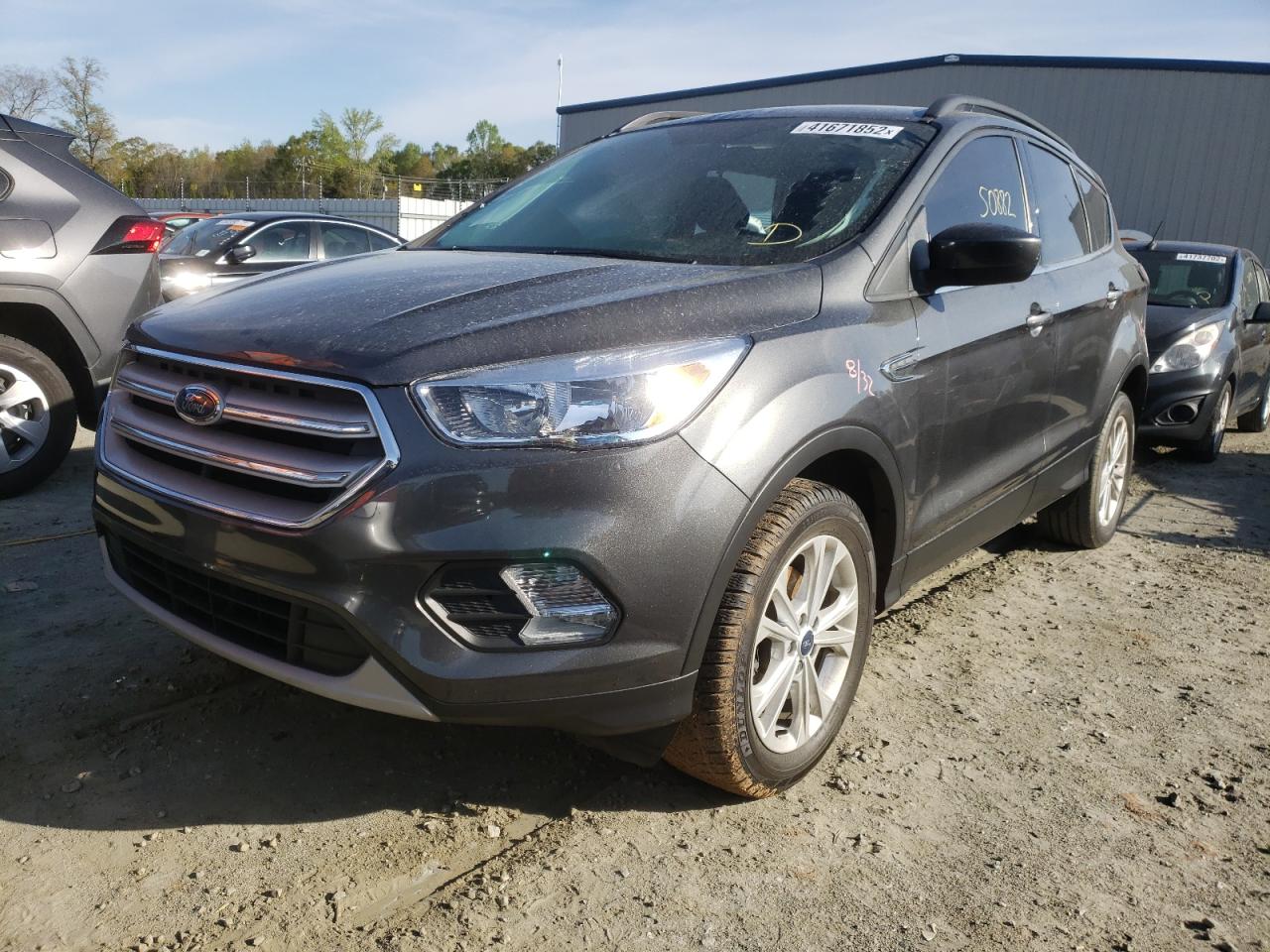 Photo 2 from auction – 2018 FORD ESCAPE SE with VIN 1FMCU0GD5JUC46901