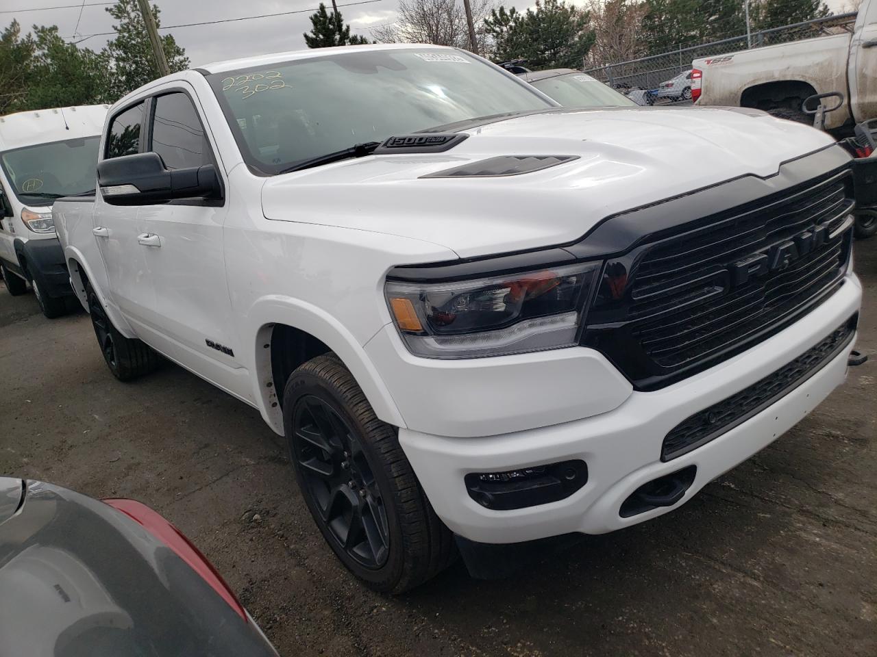 RAM 1500 LARAM 2021 with VIN 1C6SRFJTXMN579637 - Photo from auction