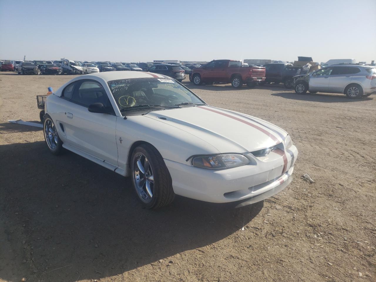 FORD MUSTANG 1998 with VIN 1FAFP4041WF149397 - Photo from auction