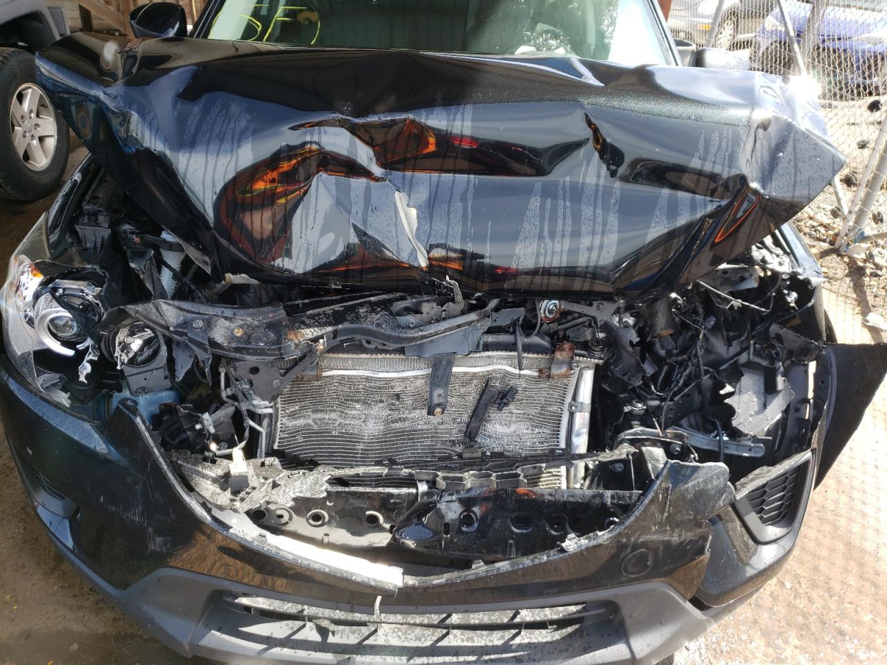 Photo 9 from auction – 2014 MAZDA CX-5 SPORT with VIN JM3KE4BE3E0380752