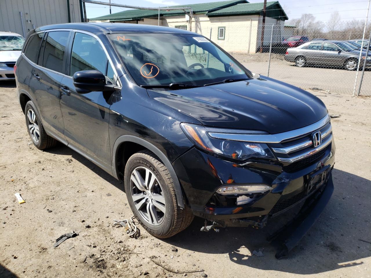 HONDA PILOT EXL 2018 with VIN 5FNYF6H55JB009056 - Photo from auction