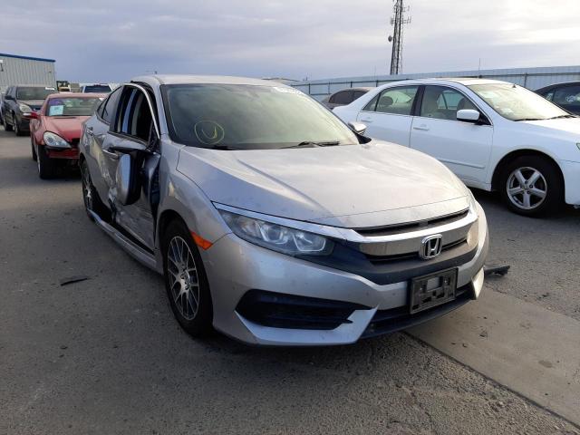 HONDA CIVIC LX 2018 with VIN 2HGFC2F57JH514054 - Photo from auction