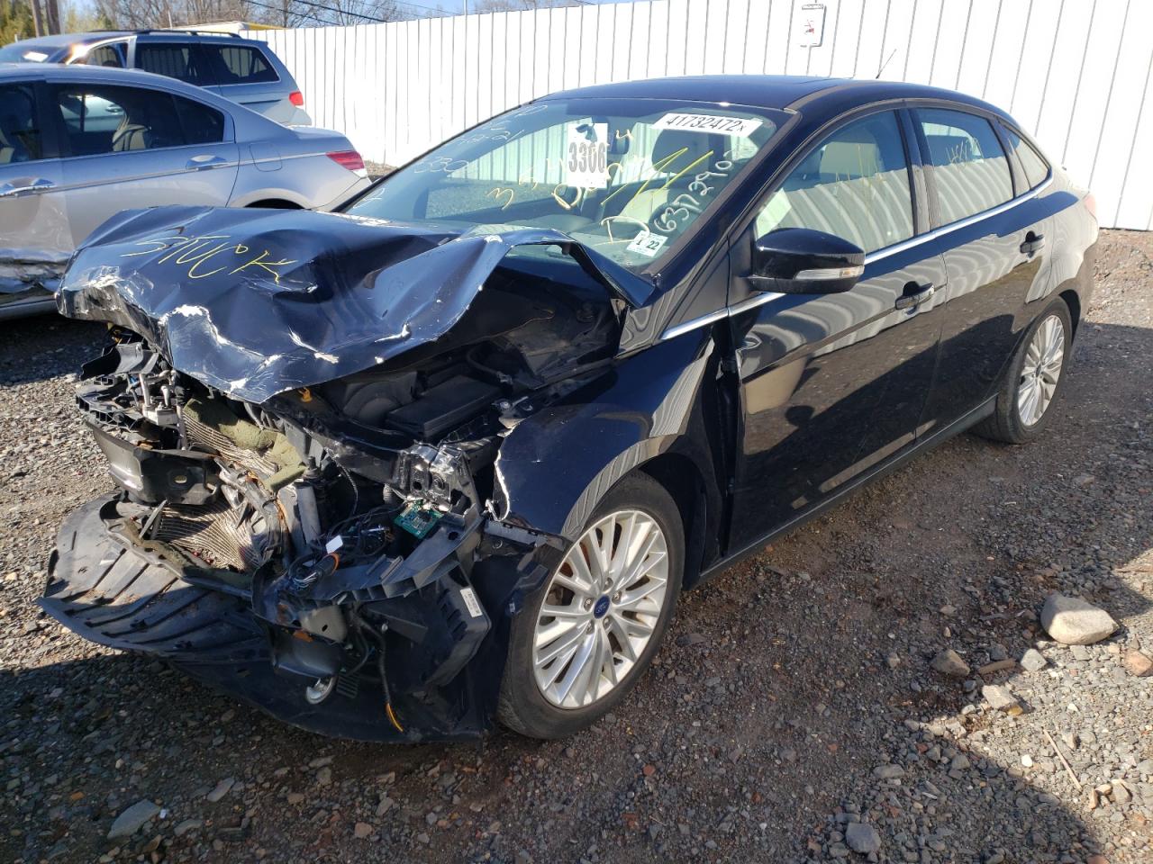Photo 2 from auction – 2016 FORD FOCUS TITA with VIN 1FADP3J29GL354614