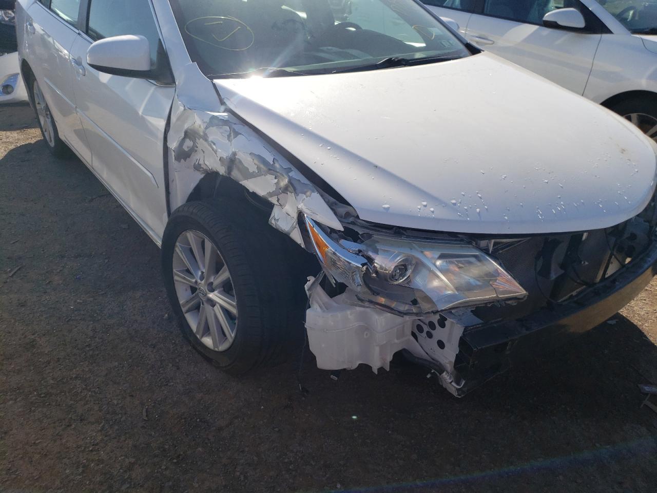 Photo 9 from auction – 2014 TOYOTA CAMRY L with VIN 4T4BF1FK0ER397569