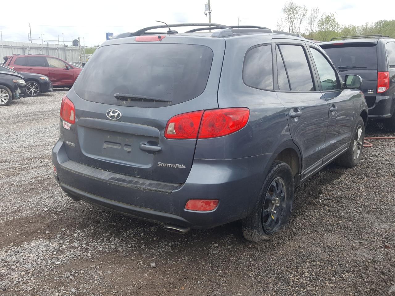 Photo 4 from auction – 2007 HYUNDAI SANTA FE G with VIN 5NMSG13D87H080621