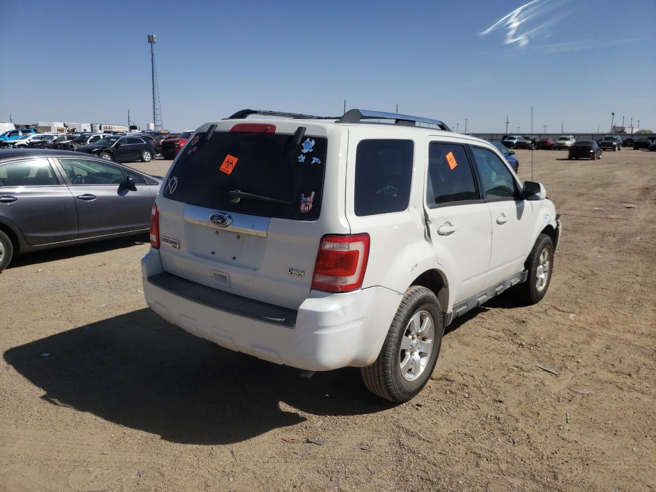 Photo 4 from auction – 2010 FORD ESCAPE LIM with VIN 1FMCU0EG2AKD20588