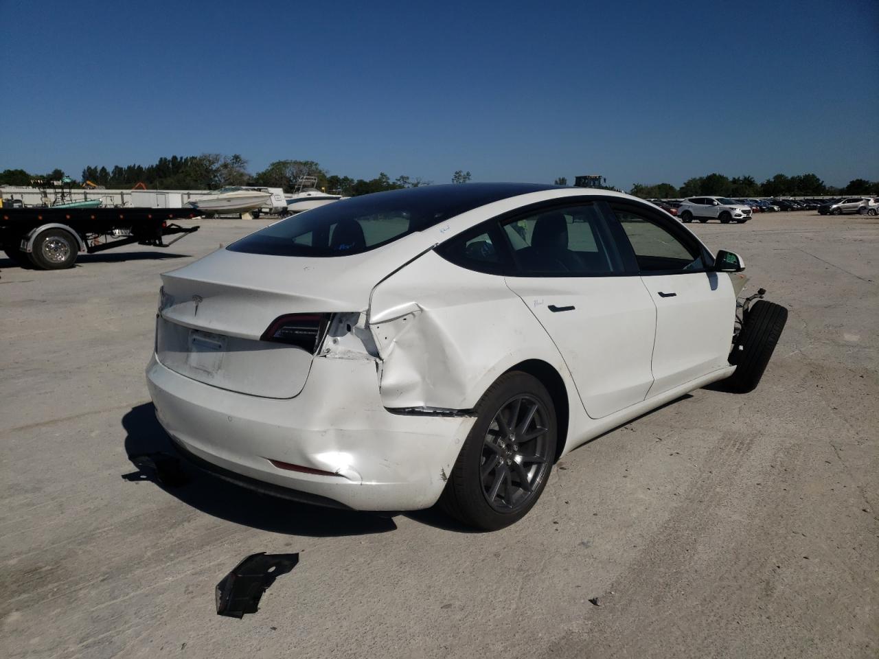 Photo 4 from auction – 2021 TESLA MODEL 3 with VIN 5YJ3E1EA8MF052277