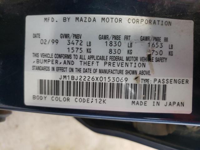 Photo 10 from auction – 1999 MAZDA PROTEGE DX with VIN JM1BJ2226X0153069