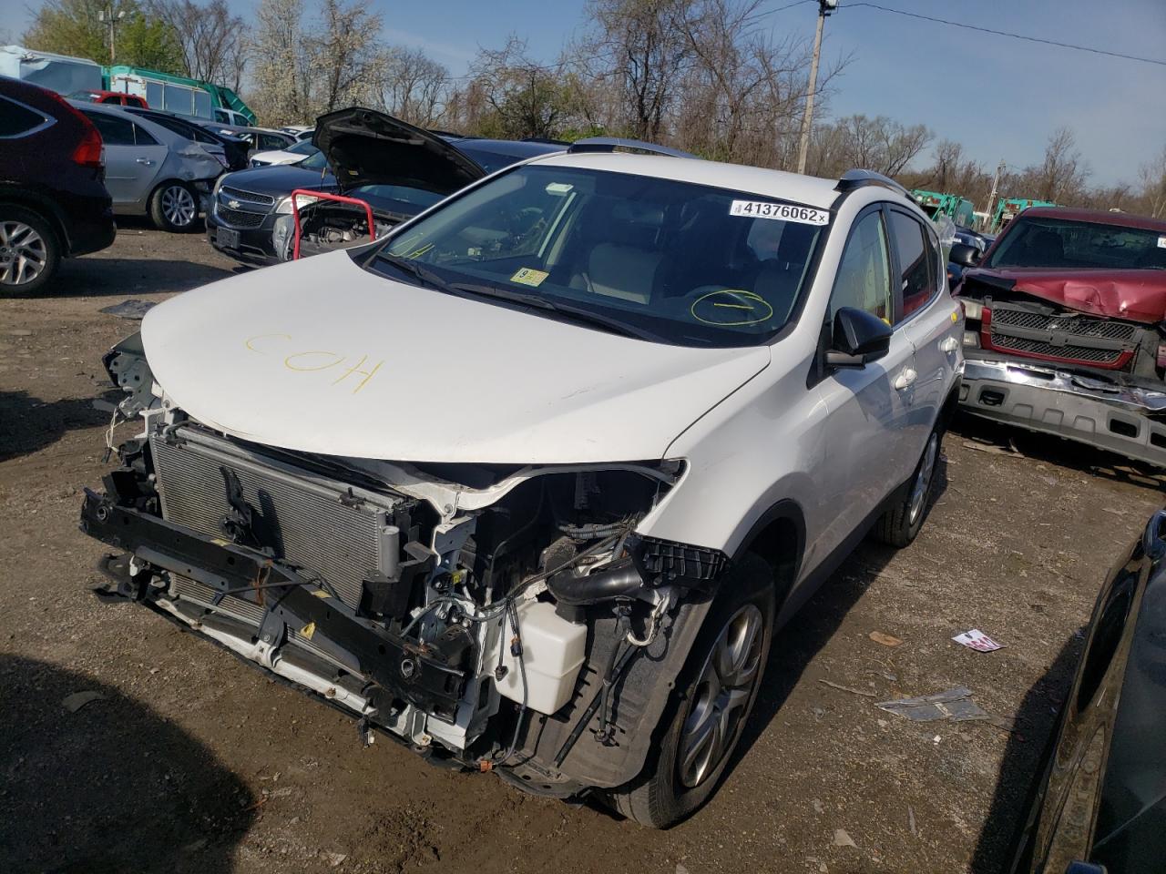 Photo 2 from auction – 2014 TOYOTA RAV4 LE with VIN JTMBFREVXED092606