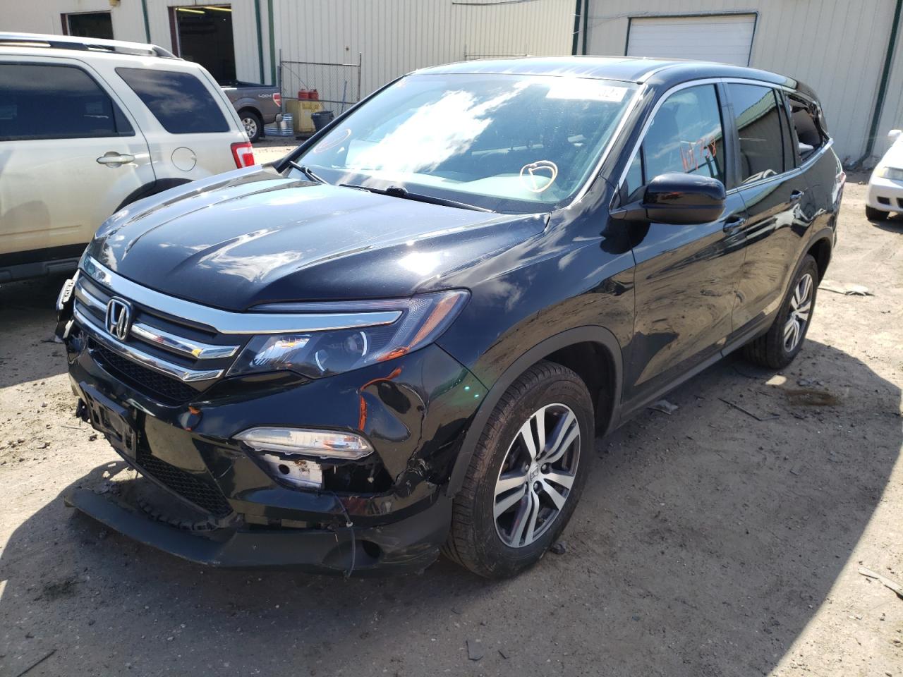 Photo 2 from auction – 2018 HONDA PILOT EXL with VIN 5FNYF6H55JB009056