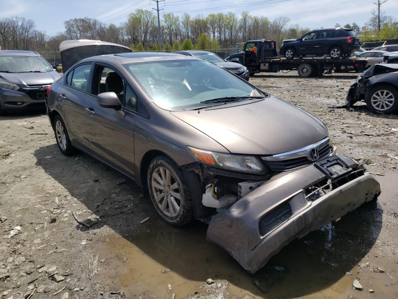 HONDA CIVIC EX 2012 with VIN 2HGFB2F8XCH565659 - Photo from auction