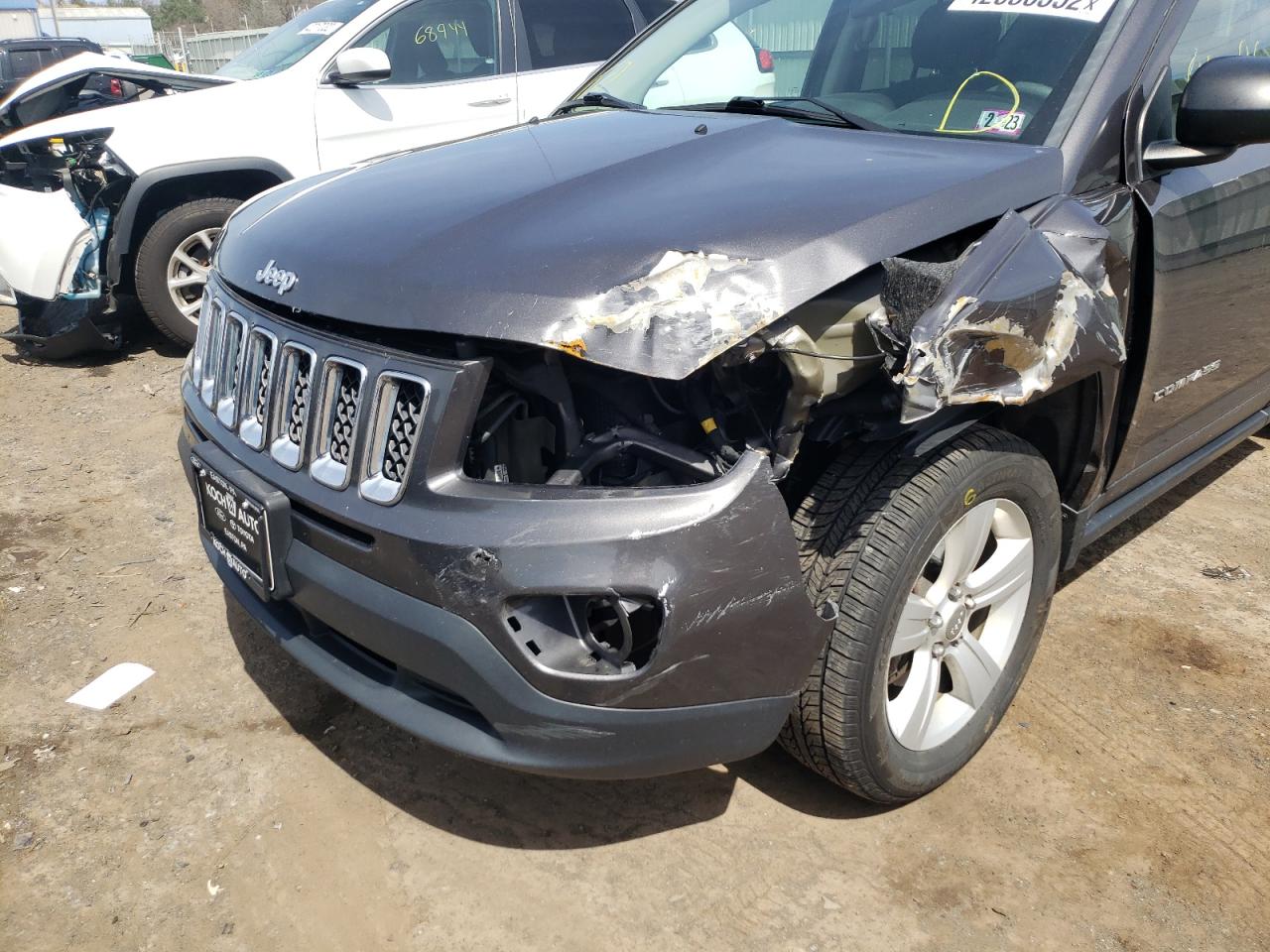 Photo 9 from auction – 2015 JEEP COMPASS SP with VIN 1C4NJDBB2FD214711