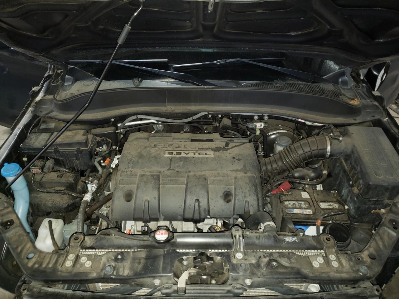 Photo 7 from auction – 2014 HONDA RIDGELINE with VIN 5FPYK1F76EB006957