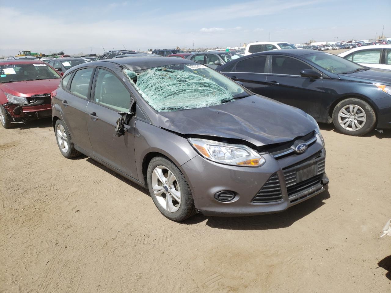 FORD FOCUS SE 2014 with VIN 1FADP3K22EL299872 - Photo from auction