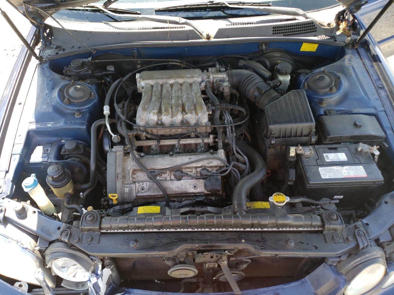 Photo 7 from auction – 2004 KIA OPTIMA LX with VIN KNAGD128045265504