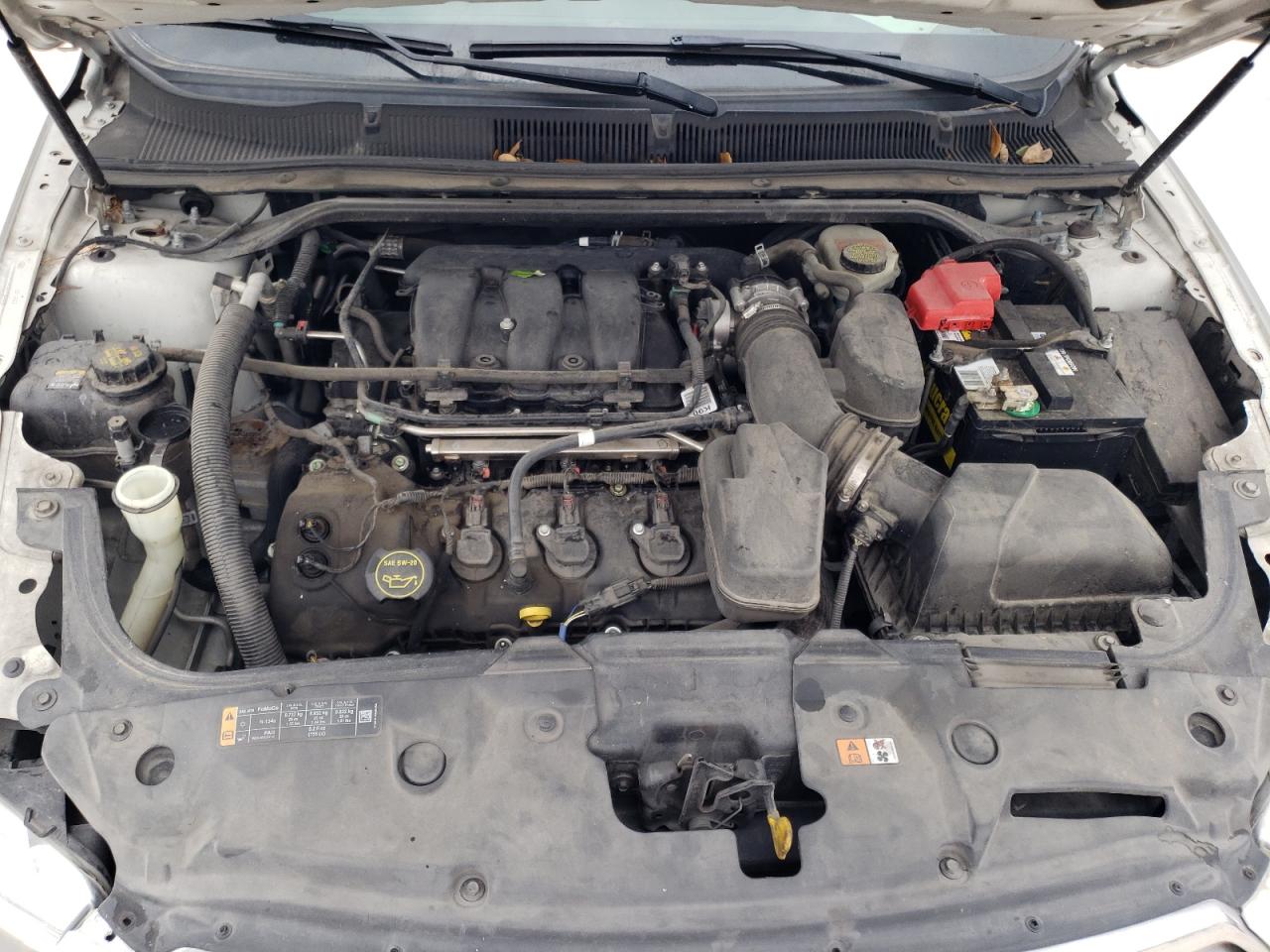 Photo 7 from auction – 2014 FORD TAURUS SE with VIN 1FAHP2D81EG143523