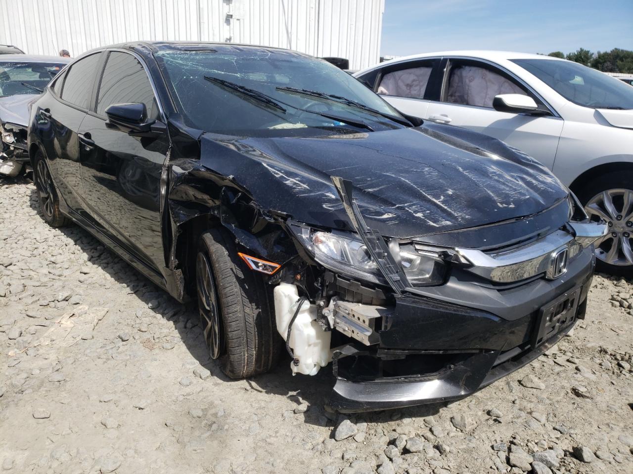 HONDA CIVIC EX 2017 with VIN 19XFC2F70HE229976 - Photo from auction