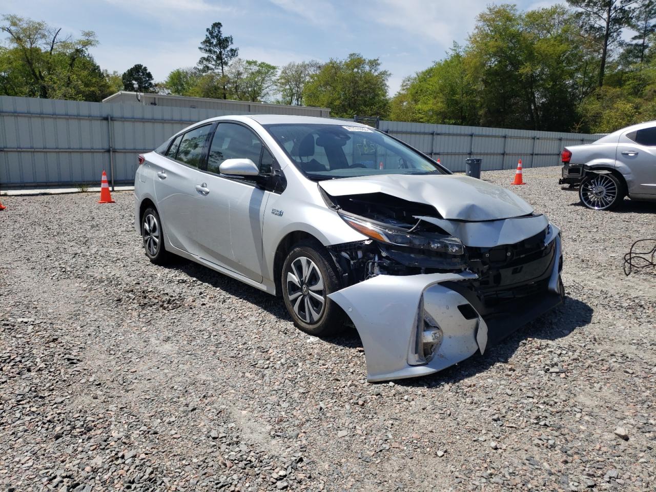 TOYOTA PRIUS PRIM 2018 with VIN JTDKARFP7J3068858 - Photo from auction