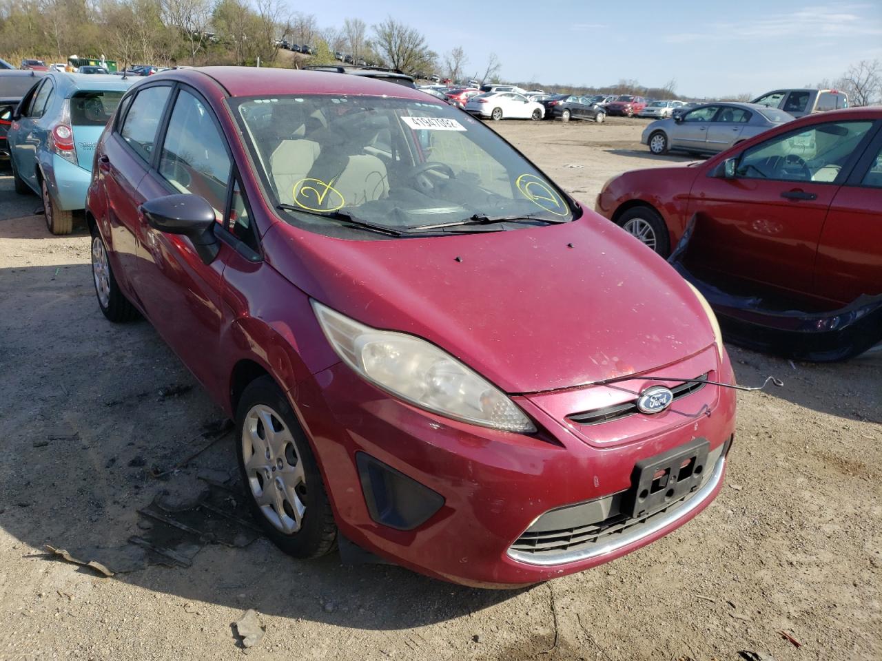 FORD FIESTA SE 2011 with VIN 3FADP4EJ4BM144372 - Photo from auction