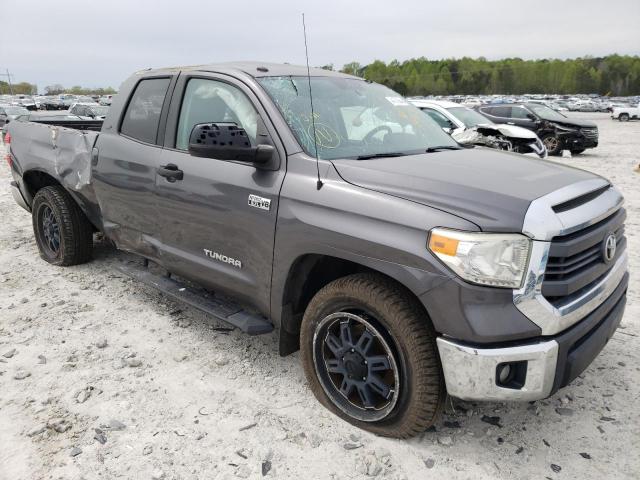 TOYOTA TUNDRA DOU 2014 with VIN 5TFRY5F19EX167033 - Photo from auction