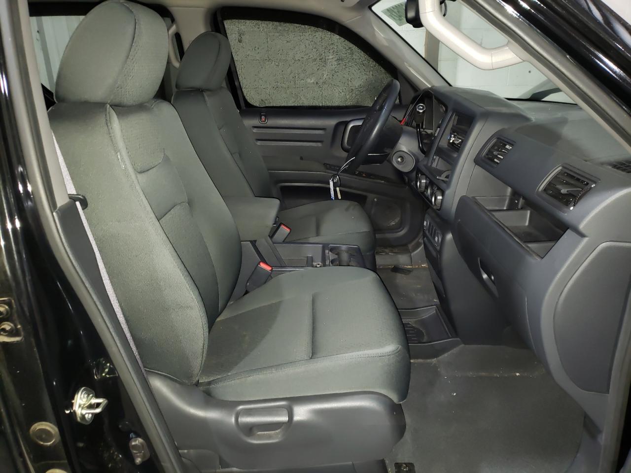 Photo 5 from auction – 2014 HONDA RIDGELINE with VIN 5FPYK1F76EB006957