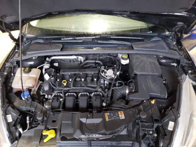 Foto 7 de la subasta – 2018 FORD FOCUS SE con VIN 1FADP3F24JL237183