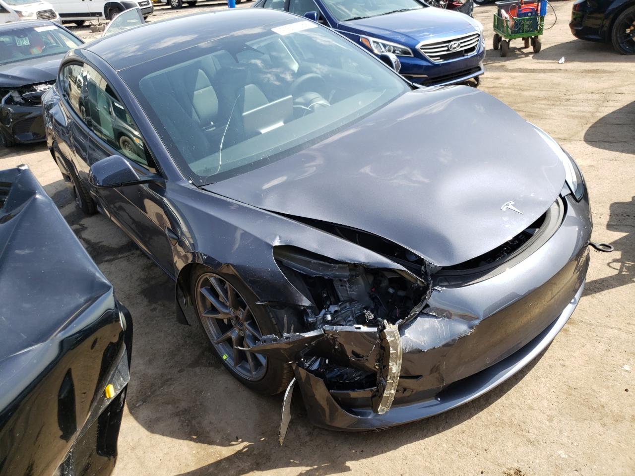 TESLA MODEL 3 2021 with VIN 5YJ3E1EB5MF067490 - Photo from auction
