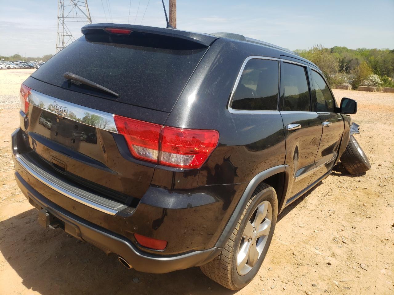 Photo 4 from auction – 2013 JEEP GRAND CHER with VIN 1C4RJECT0DC526821