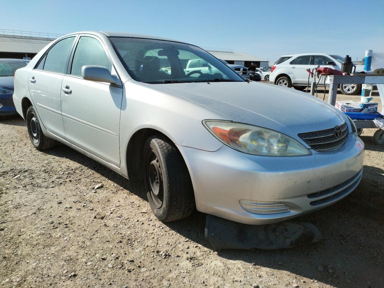 TOYOTA CAMRY LE 2004 with VIN 4T1BE32K24U891977 - Photo from auction