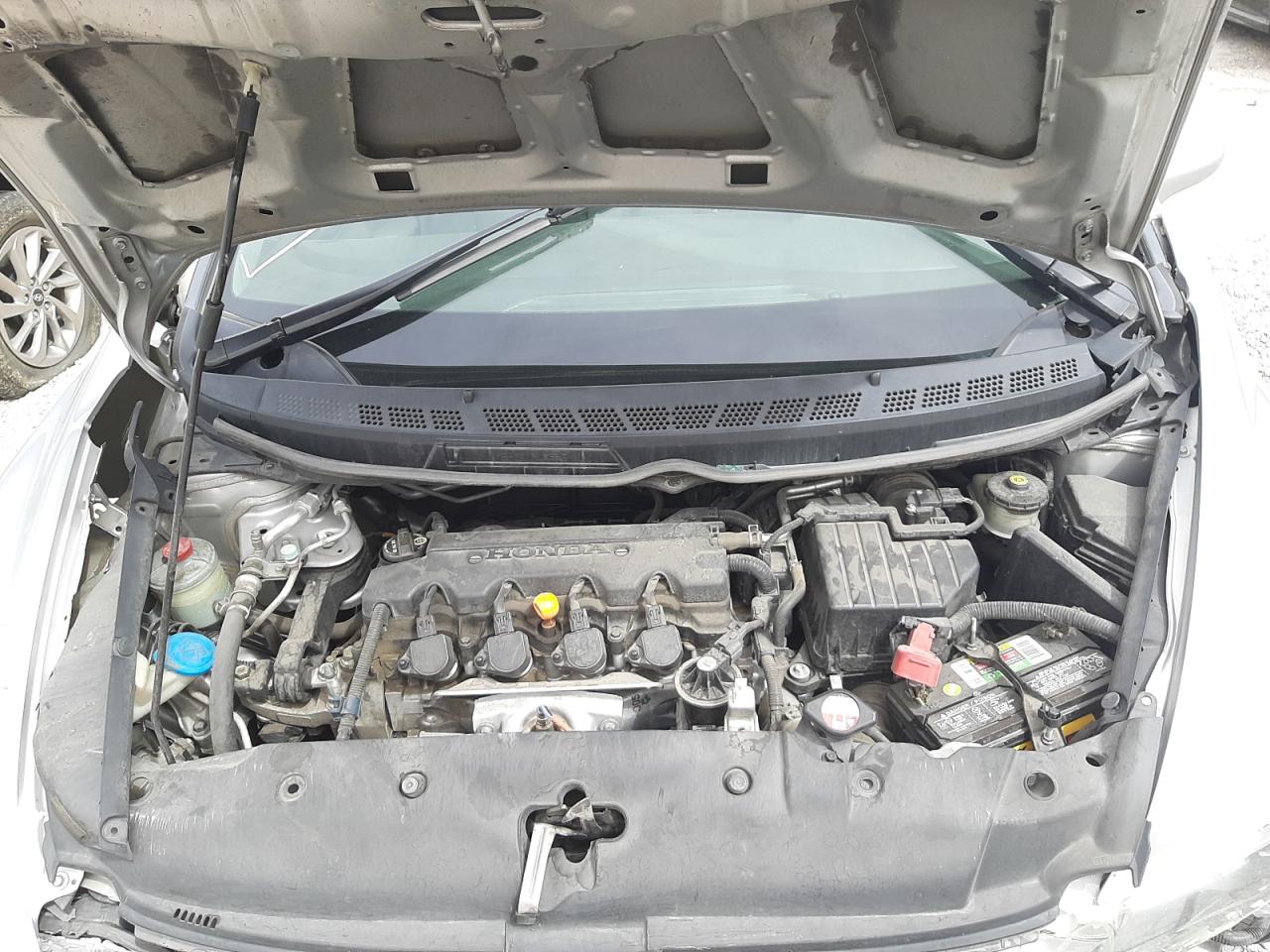 Photo 7 from auction – 2010 HONDA CIVIC LX with VIN 19XFA1F53AE032403