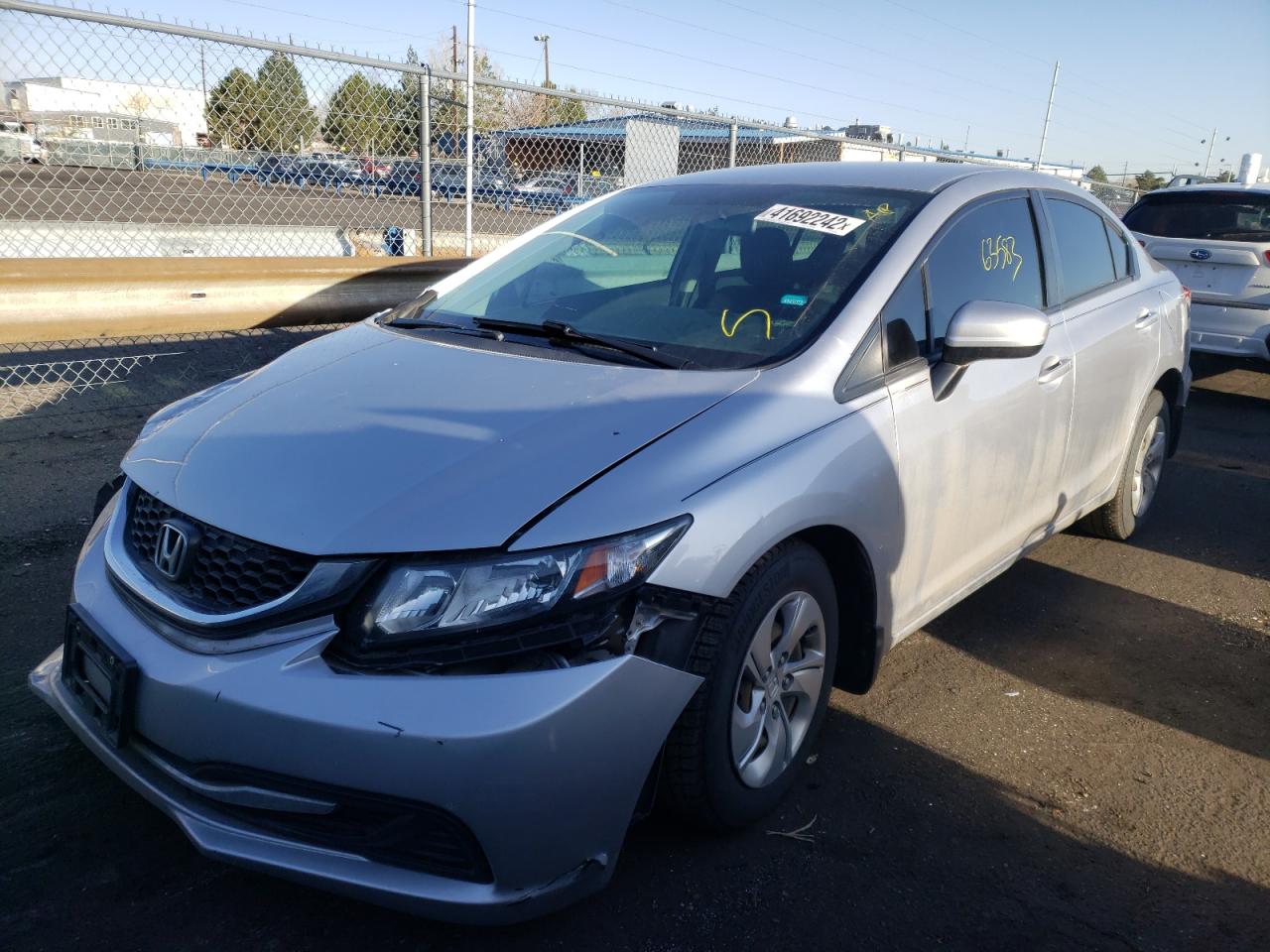Photo 2 from auction – 2014 HONDA CIVIC LX with VIN 19XFB2F57EE081970