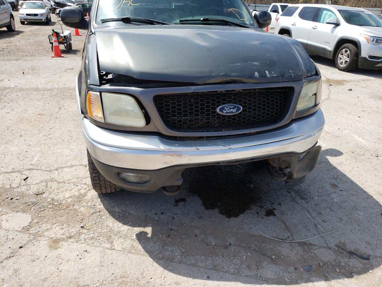 Photo 9 from auction – 2002 FORD F150 with VIN 1FTRX18L32NA84909