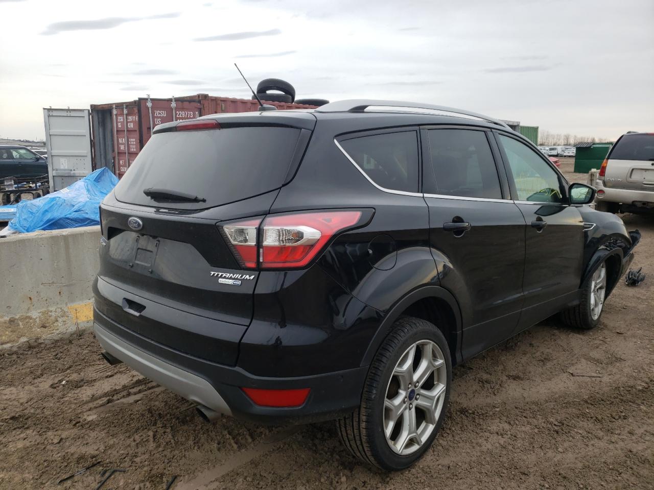 Photo 4 from auction – 2017 FORD ESCAPE TIT with VIN 1FMCU9J94HUC20504