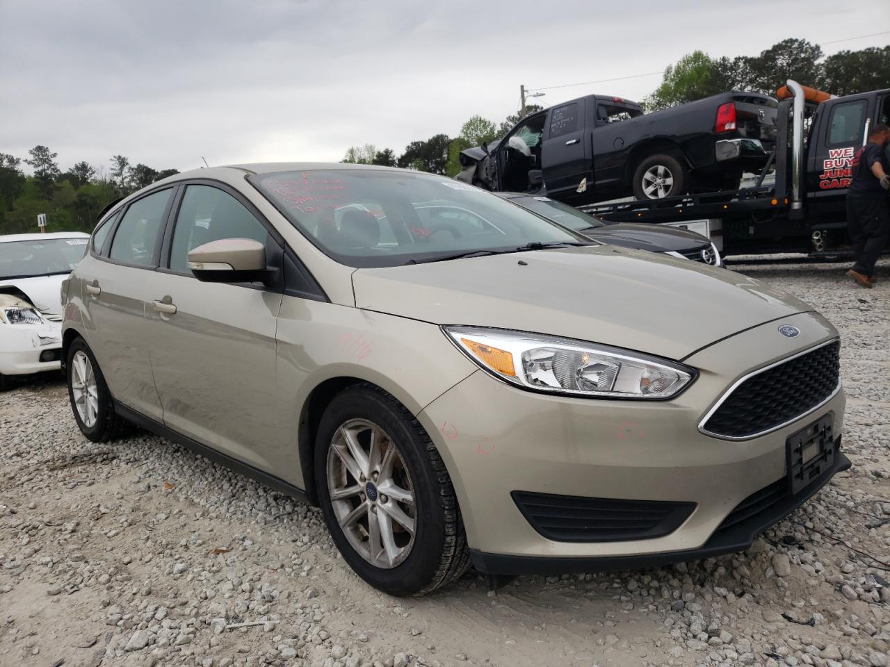 FORD FOCUS SE 2016 with VIN 1FADP3K29GL389443 - Photo from auction
