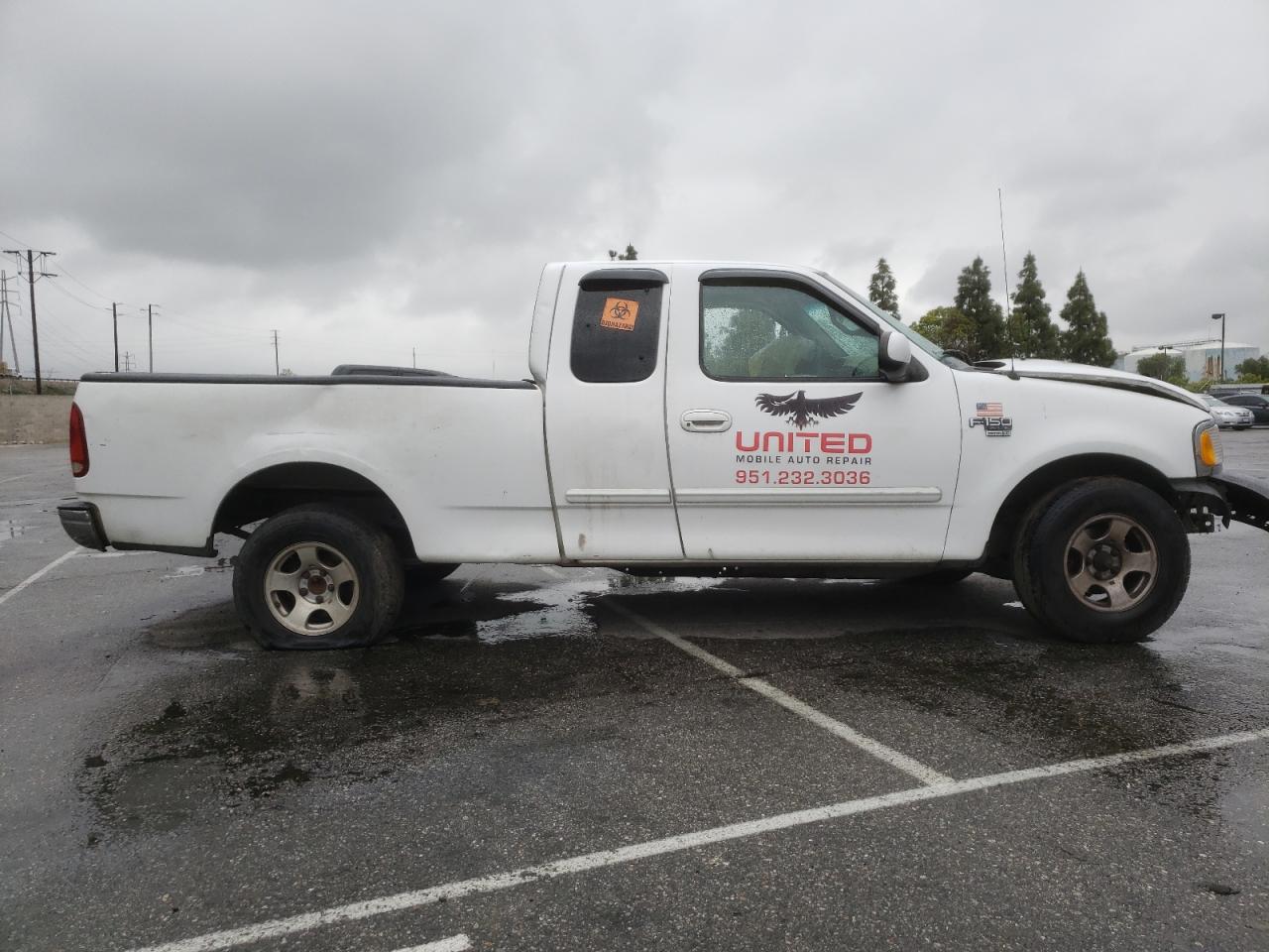 Photo 9 from auction – 2000 FORD F150 with VIN 1FTRX17L4YKA93968