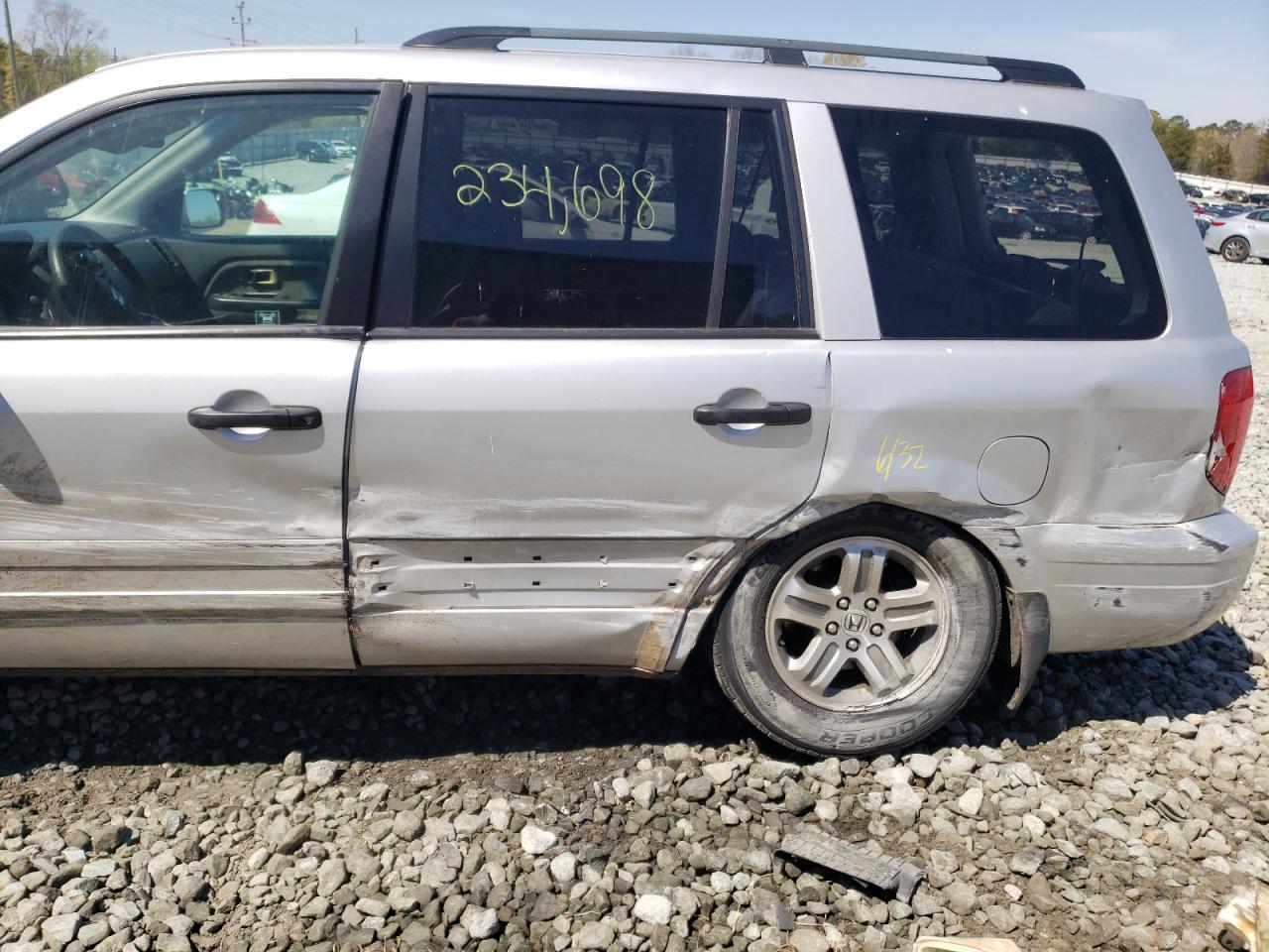 Photo 9 from auction – 2003 HONDA PILOT EX with VIN 2HKYF18463H581008