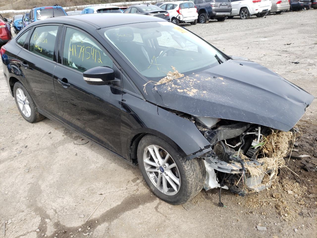 FORD FOCUS SE 2017 with VIN 1FADP3F24HL323510 - Photo from auction