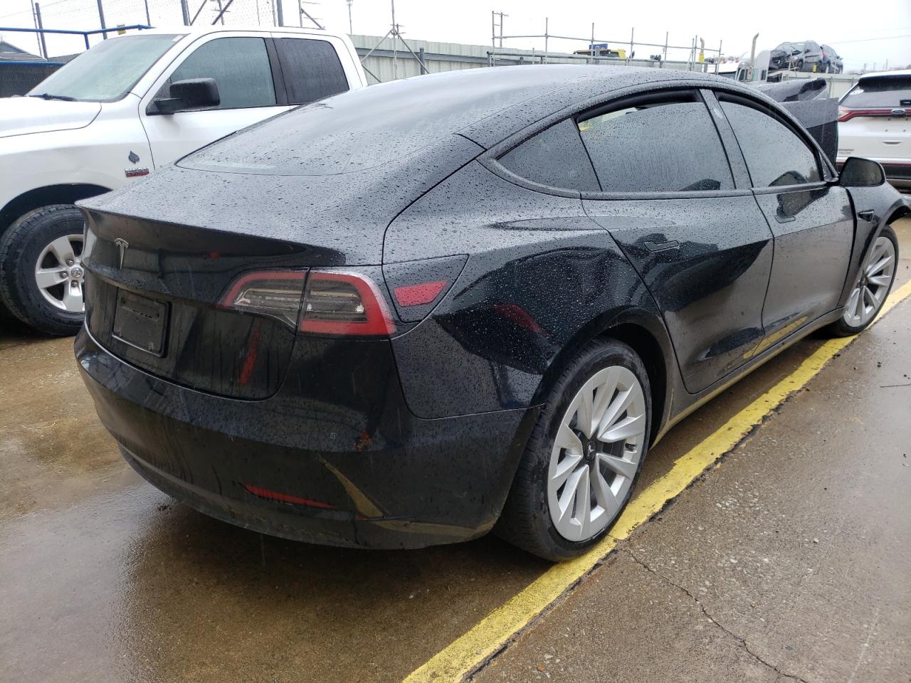 Photo 4 from auction – 2021 TESLA MODEL 3 with VIN 5YJ3E1EA0MF019242