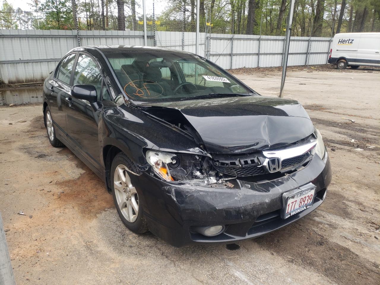 HONDA CIVIC LX 2009 with VIN 19XFA16599E000261 - Photo from auction