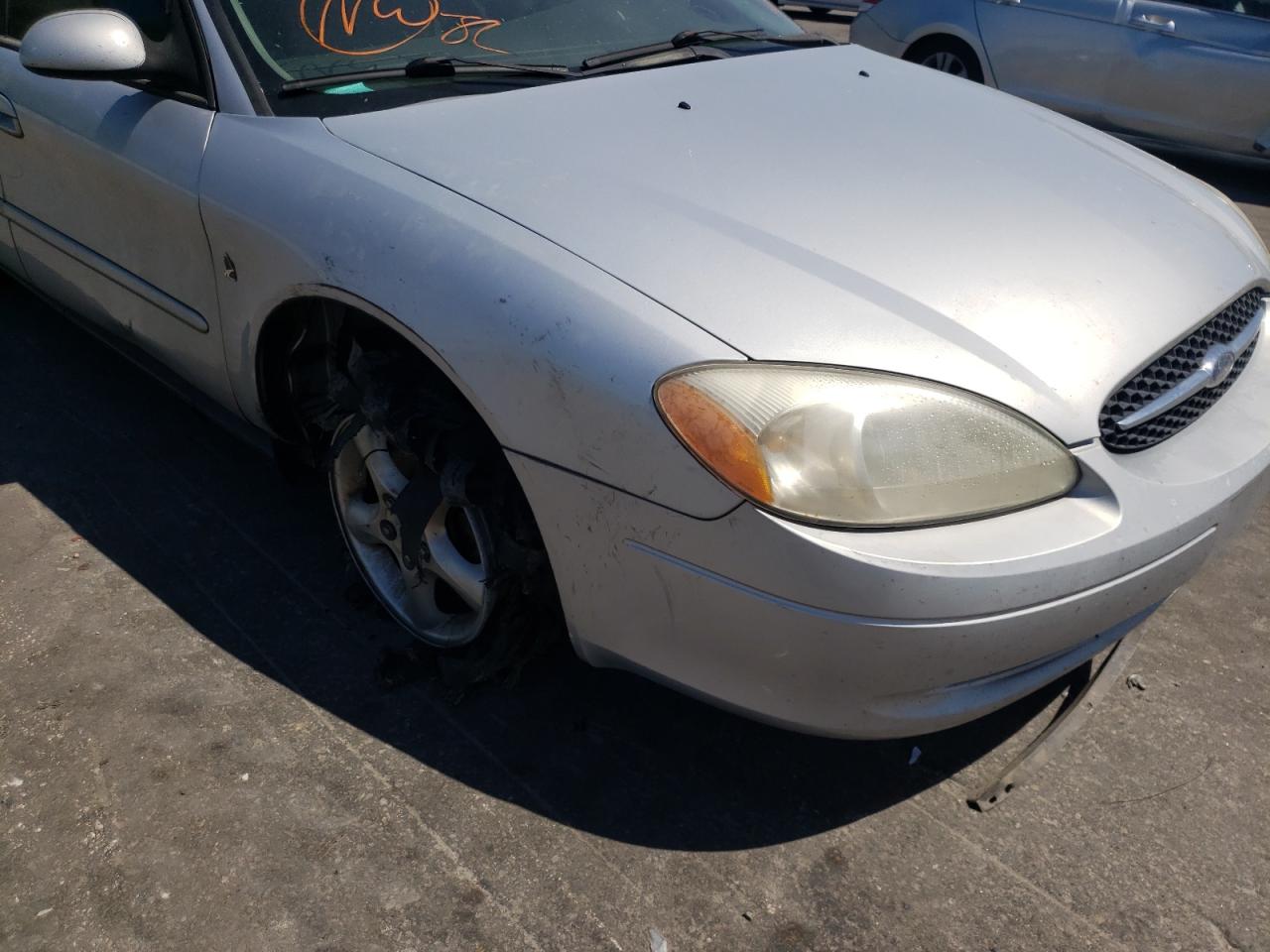 Photo 9 from auction – 2001 FORD TAURUS SES with VIN 1FAFP55231G228165